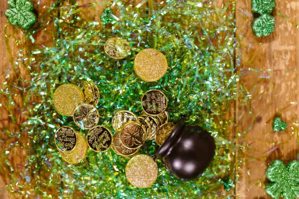 pot of gold spilt on top of green packaging